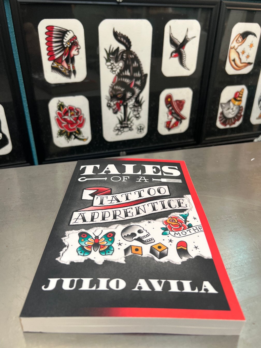 Tales of a Tattoo Apprentice book shown in Julios Tattoo Shop